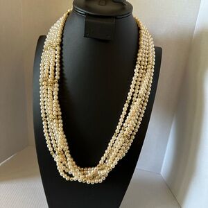 Faux Pearl and gold multi strand plastic bead necklace
